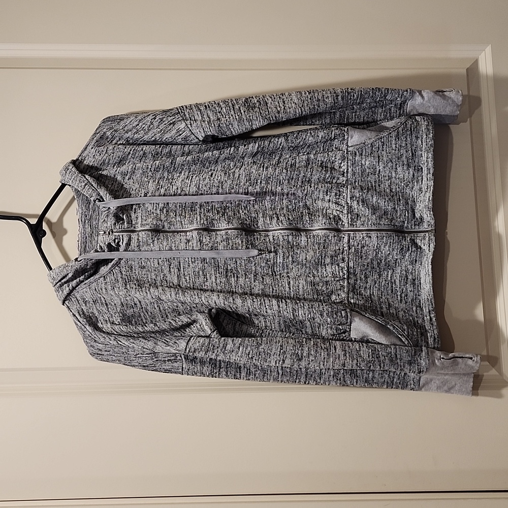 Athletica zipper hoodie with thumb holes and side pockets